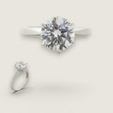 2ct Round-Cut center solitaire ring  with 6 prong setting. Center stone size: 8mm.