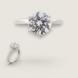 2.5ct Round Cut Solitaire ring. Center stone size: 9mm.