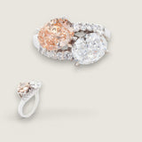 2 Oval Cut stones in the center of 4ct  surrounded by 10 Round Cut stones of .5ct F419-COF-CZ-14K