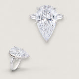 20ct Large Pear-shaped Center  with 2 Baguettes on the sides of 1.5ct TCW. Center stone size: 24x14mm F502-CZ-14K
