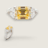 3.25ct Emerald Cut Center  with 2 Trillion cut stones on the sides of 1.1 TCW. Center stone size: 10x8mm.   F245-CAN-CZ-14K