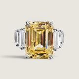 8ct Emerald Cut Center  with 6 Graduated Baguettes of 1 TCW on the sides. Center stone size: 13x10mm F217-CAN-CZ-14K