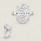 15ct Large Oval Cut Center with 2 Baguette Cut of .5ct  on the sides.    F60-CZ-14K