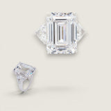 14ct Emerald Cut Center with 2 Trillion cut stones of 5 TCW on the sides. Center stone size: 17.25x12.75mm F197-CZ-14K