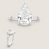 4ct Pear-Shaped Center with 2 Baguette Cut .75TCW. Center Stone Size: 14x9mm   CJP-7-CZ-14K