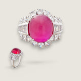 9ct Oval Cabochon Center surrounded by 18 Round Cut stones of 2.75ct  and 10 Baguette cut stones of .8ct down the sides.   17500-RUB-CZ-14K