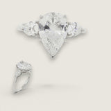 2.5ct Pear-Shape Center with 1ct Pear-Shape Cut stones on the sides. Center Stone Size: 12x8mm 17150PS-CZ-14K