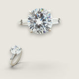 7.5ct Round Cut Center with .5ct Baguette Cut Stones on the sides. Center stone size: 13mm 17158-15-CZ-14K