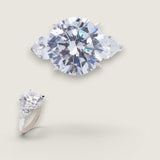 6.5ct Round Cut Center with 1.5ct Pear-Shape Cut on the sides. Center stone size: 12mm 17293-12-CZ-14K