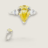 2.5ct Pear-Shape cut Center with 1ct Pear-Shape Cut on the sides. Center stone size: 12x8mm 17150PS-CAN-CZ-14K