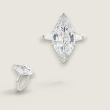 7.5ct Marquise Cut Center with 5ct Baguette Cut on the sides. Center stone size: 20x10mm 17152-10-CZ-14K