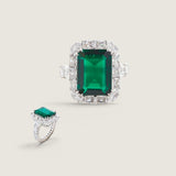 10.5CT LAB EMERALD RING WITH OVAL AND ROUND ETERNITY BAND