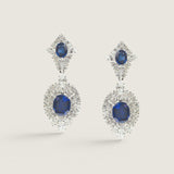 OVAL SAPPHIRE TOP SURR BY ROUND W/ LARGE OVAL BTTM SURR BY ROUNDS
