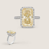 14 X 8.5 NARROW EMERALD CUT RING WITH STONES AROUND AND FILAGREE