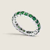 Round Emerald Eternity Band
