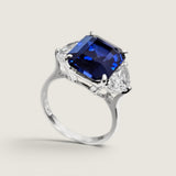 4.5ct Emerald Cut Center with 2 Half Moon cut stones