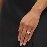 4ct Round Cut Center with .5ct Baguette Cut Stones on the sides. Center stone size: 10.5mm 17158-8-CZ-14K