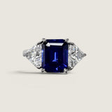 2.5ct Emerald Cut Center with 2 Trillion Cut stones of 1.1ct on the sideS