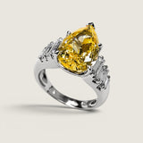 5ct Pear-Shaped Cut Center with 6 Baguette Cut of 1TCW on the sides.