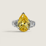 5ct Pear-Shaped Cut Center with 6 Baguette Cut of 1TCW on the sides.