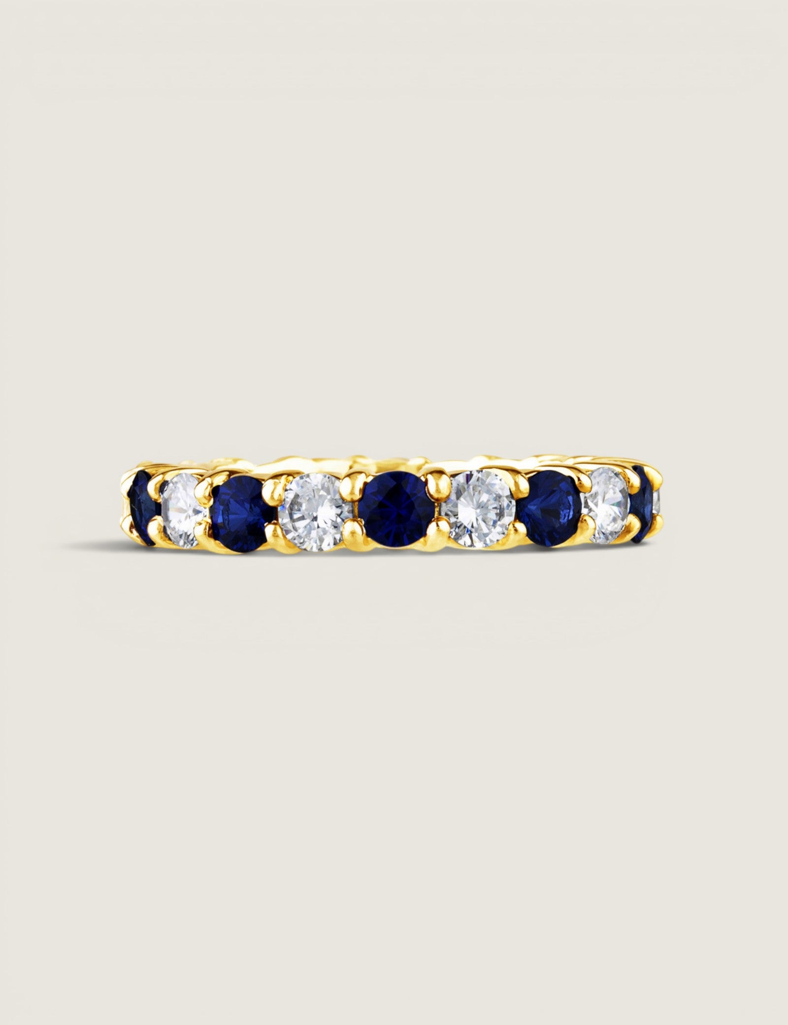 Round Sapphire Eternity Band