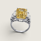 8ct Emerald Cut Center  with 6 Graduated Baguettes of 1 TCW on the sides. Center stone size: 13x10mm F217-CAN-CZ-14K