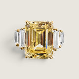 8ct Emerald Cut Center  with 6 Graduated Baguettes of 1 TCW on the sides. Center stone size: 13x10mm F217-CAN-CZ-14K