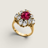2ct Oval Cut Center Ring  surrounded by 4 Marquise stones (.65ct) & 6 Oval stones (1.5ct). Center stone size: 9X7mm. F306-RUB-CZ-14K