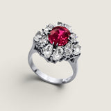 2ct Oval Cut Center Ring  surrounded by 4 Marquise stones (.65ct) & 6 Oval stones (1.5ct). Center stone size: 9X7mm. F306-RUB-CZ-14K