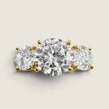 2.5ct Round Cut Center with 2 Round Cut Stones of 1.25ct on the sides. Center stone size: 9mm.    F315-CZ-14K