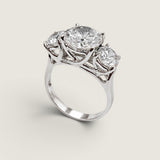 2.5ct Round Cut Center with 2 Round Cut Stones of 1.25ct on the sides. Center stone size: 9mm.    F315-CZ-14K
