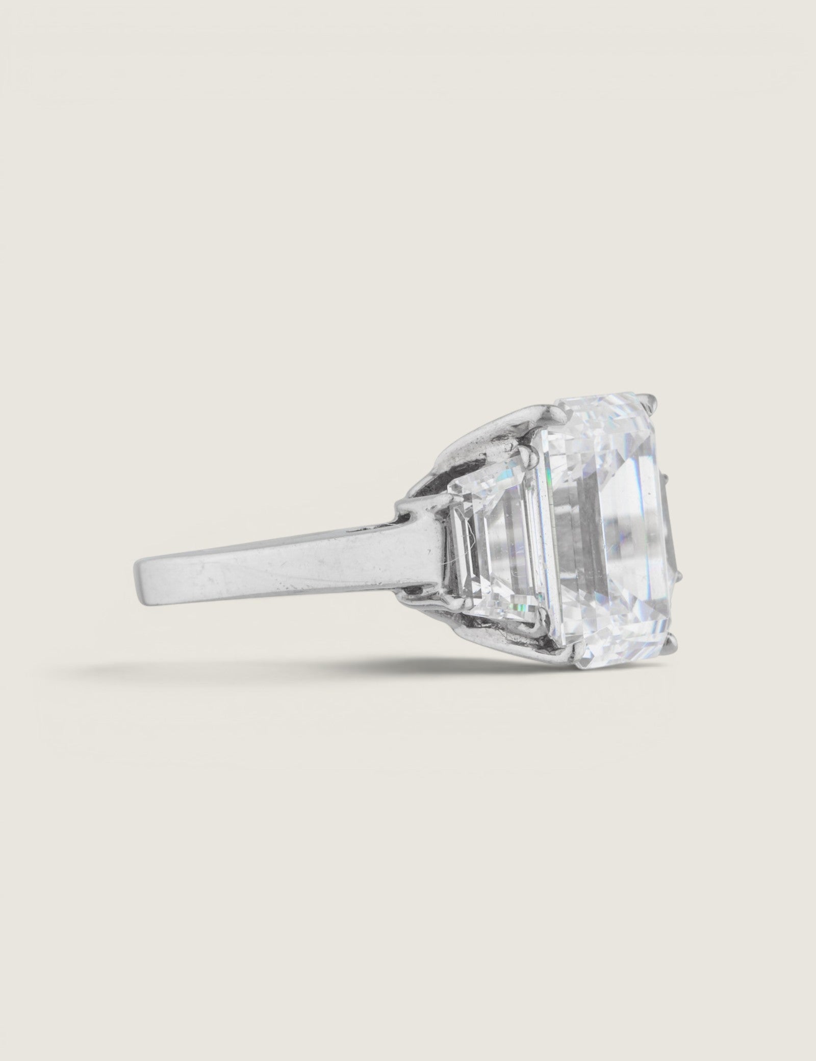 Emerald-Cut and Trapezoid Three stone Ring (8 TCW)