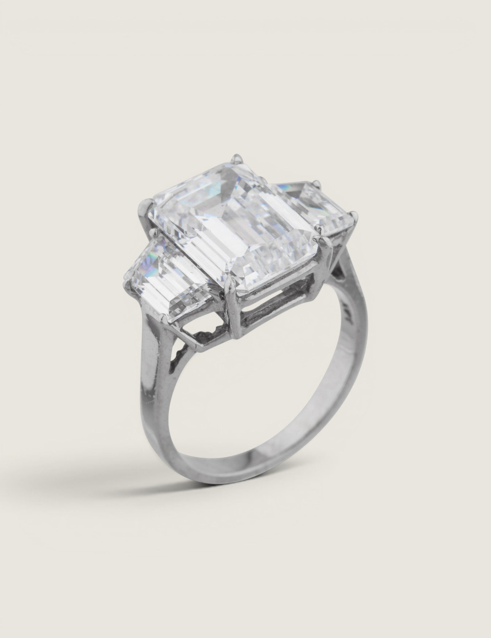 Emerald-Cut and Trapezoid Three stone Ring (8 TCW)