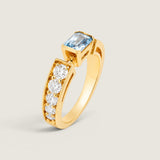 BEZEL EMER CUT W/ ROUNDS STONE F856-AQUA-CZ-14K