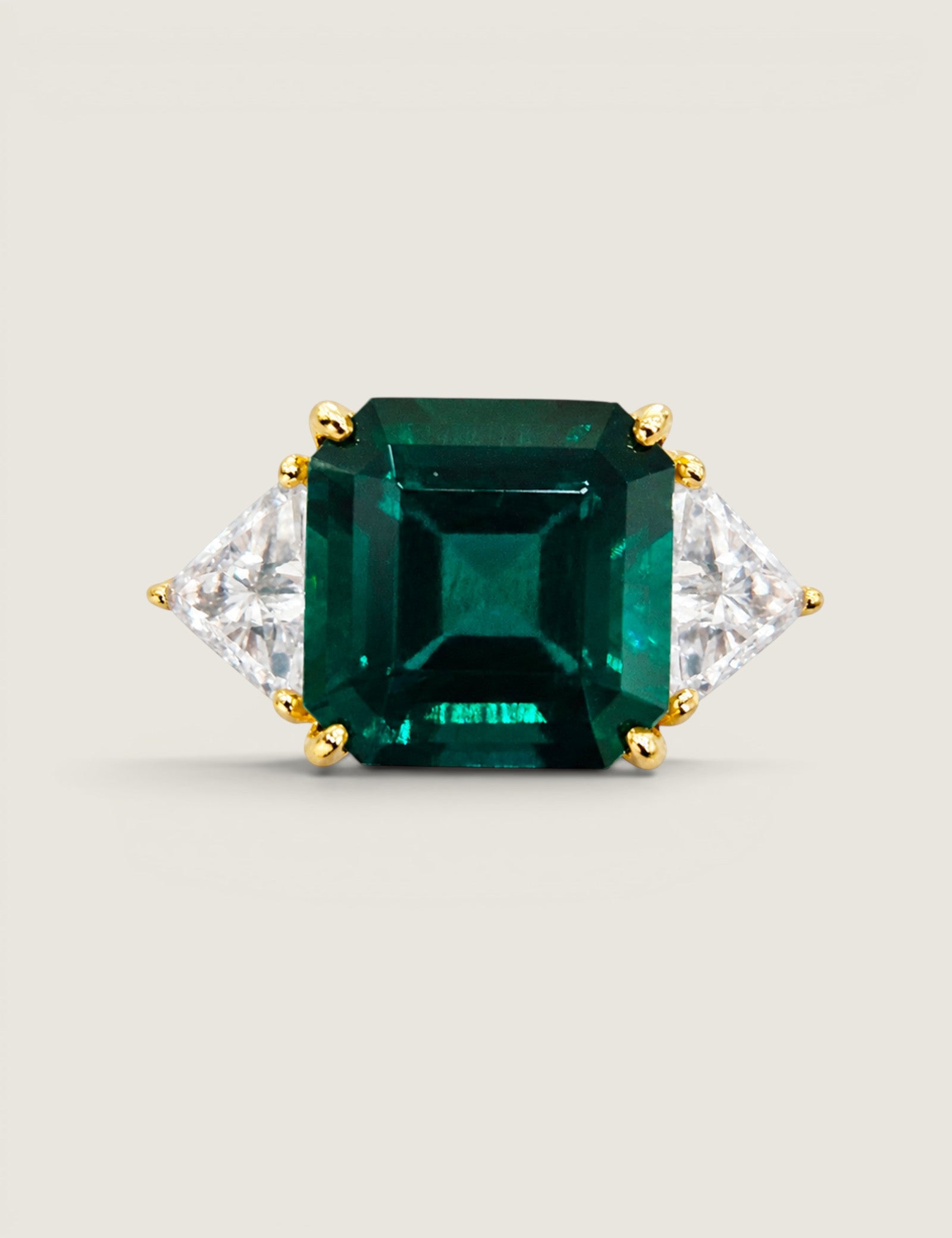 Asscher Cut Emerald With Trillion Side Stones