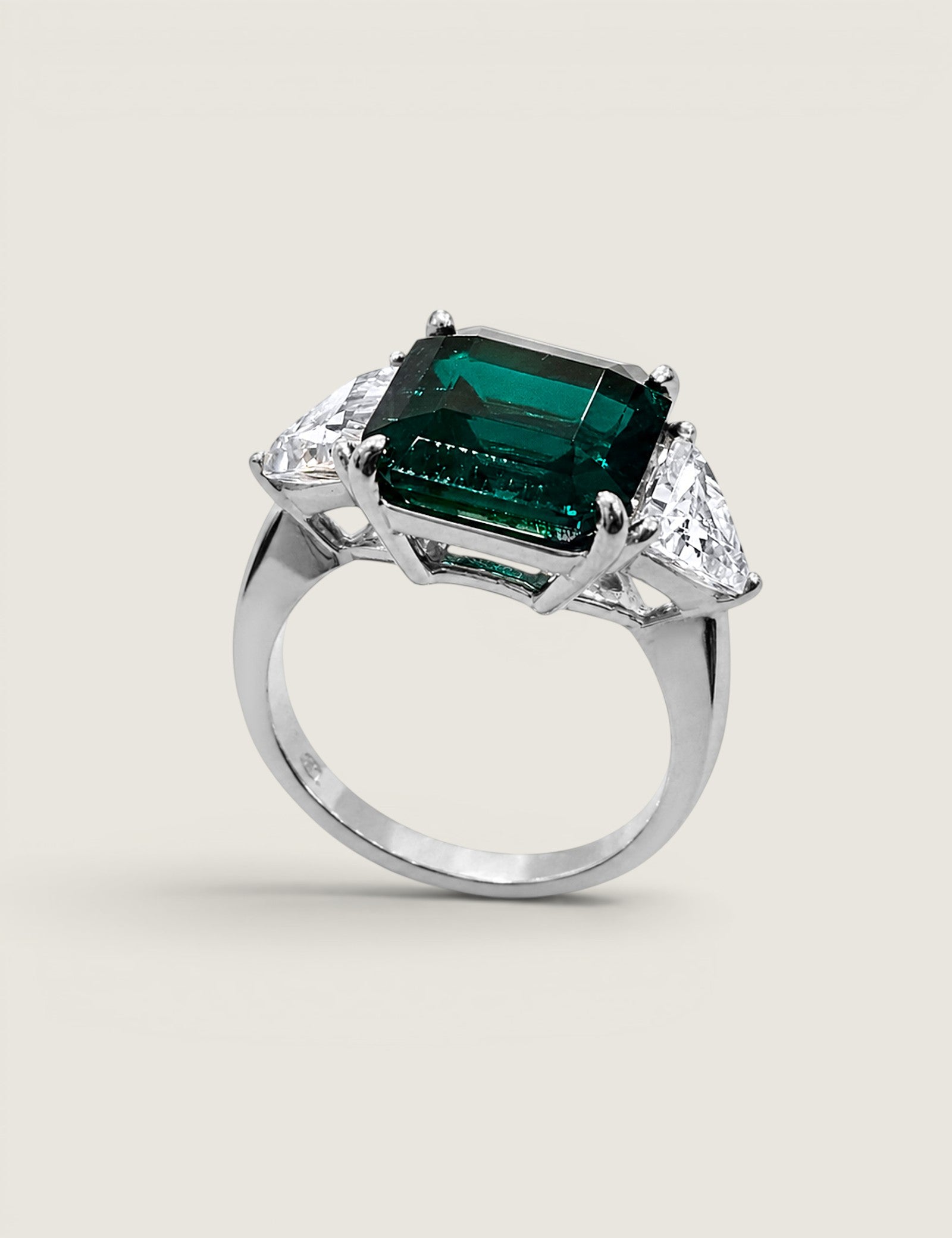 Asscher Cut Emerald With Trillion Side Stones