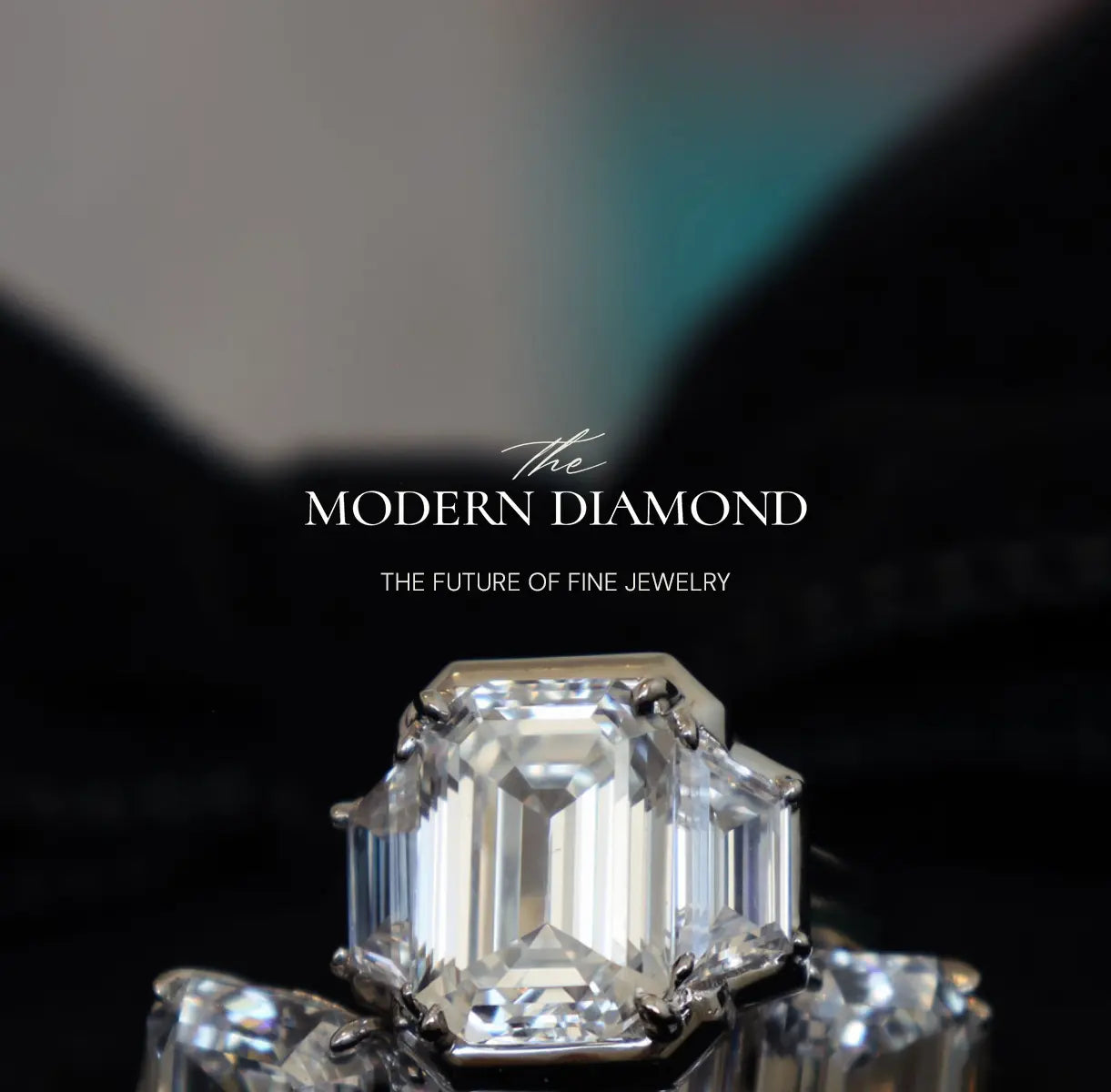 A close-up of a diamond ring with a large emerald-cut center stone and smaller side stones, set in a silver-toned metal. The background is dark and blurred with a teal glow, and the text 'The MODERN DIAMOND THE FUTURE OF FINE JEWELRY' is overlaid in the center.