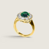 2.5ct oval ctr. surr. by 10 rds.  T13092-EM-CZ-14K