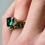 Round Emerald Eternity Band