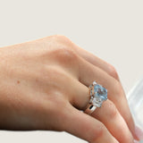 Wide Shank 3.5ct Emerald Cut Aquamarine Center with 2 Emerald Cut stones of 2ct on the sides.