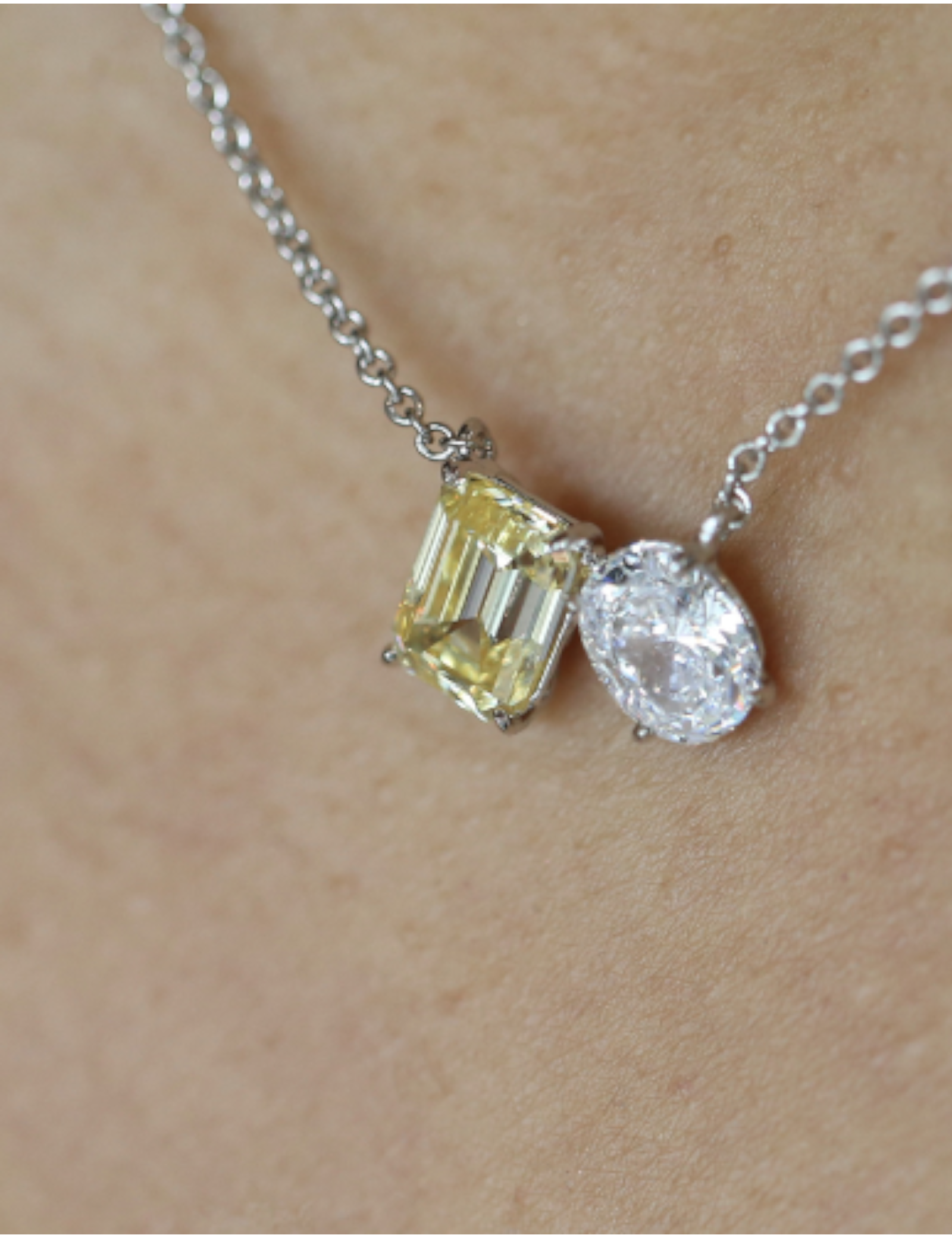 Toi et Moi Pendant. 1.5ct(9x7)Canary Emerald and 1.5ct (8.5x6.5) Oval shape on 16" chain.