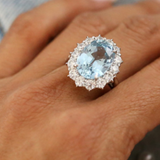 Oval Aqua Center Ring in a Halo Setting