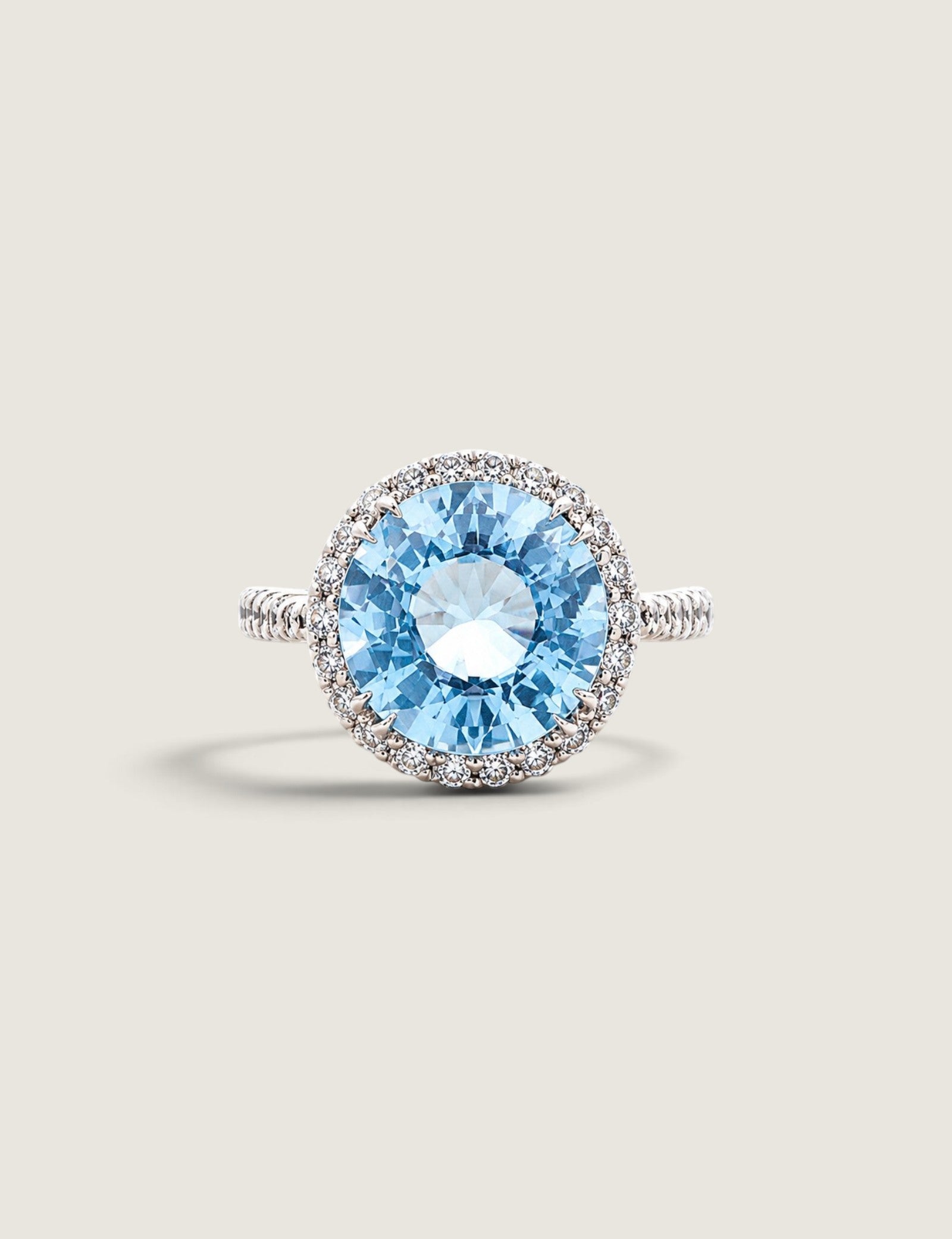 Aqua Round Stone in a Micro-pave Setting - Fantasia by DeSerio