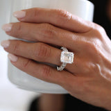 Emerald Cut Center with Side Stones Ring