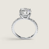 2.5CT CENTER WITH STONES ON SHANK AND BASKET