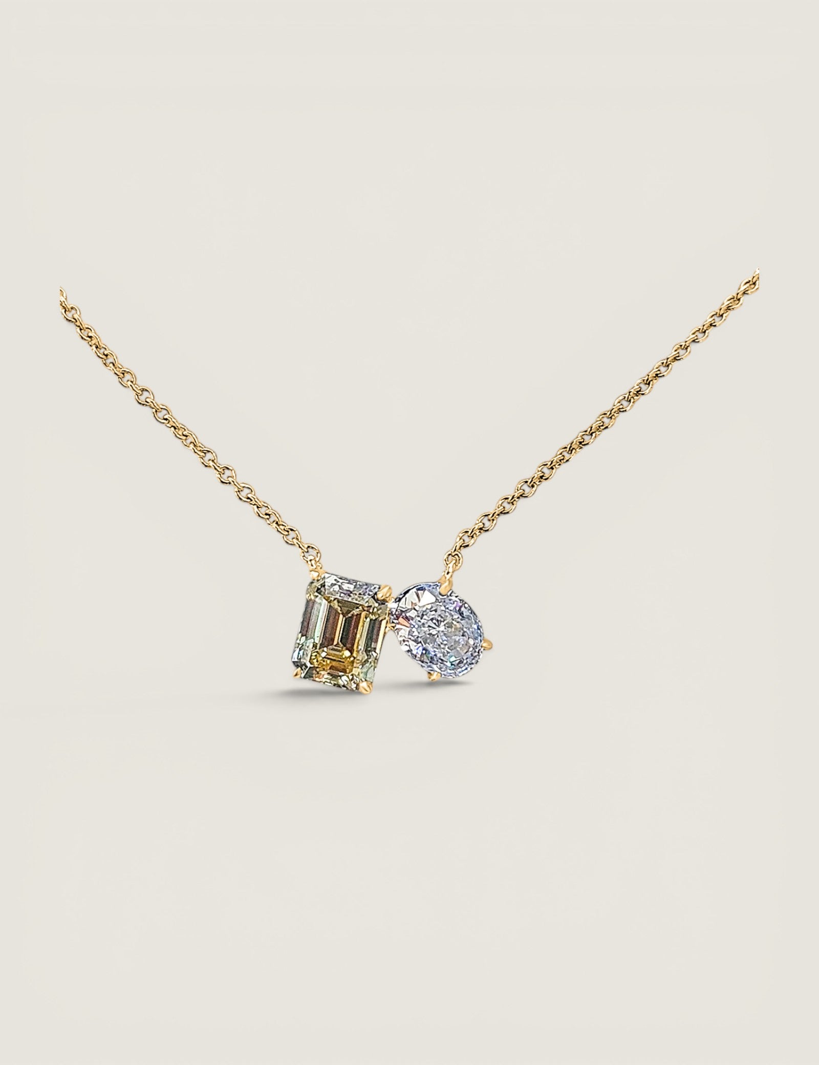 Toi et Moi Pendant. 1.5ct(9x7)Canary Emerald and 1.5ct (8.5x6.5) Oval shape on 16" chain.